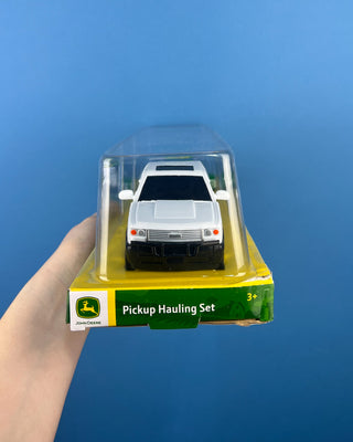 Shop the John Deere Pickup Hauling Set featuring a pickup truck, trailer, and riding mower. Officially licensed by John Deere for ages 3+.