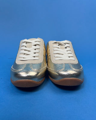 Shop the Stella Metallic Gold Slip On Sneaker featuring a metallic faux leather finish, cushioned comfort, and an easy slip-on design for everyday style.