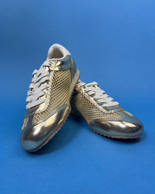 Shop the Gold Mesh Metallic Accent Sneaker featuring breathable mesh, metallic gold accents, cushioned comfort, and a lightweight everyday design.