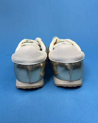 Shop the Gold Mesh Metallic Accent Sneaker featuring breathable mesh, metallic gold accents, cushioned comfort, and a lightweight everyday design.