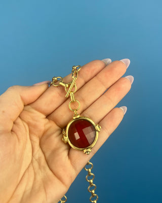 Shop the Chunky Chain & Colored Stone Necklace featuring a gold-tone chunky chain, faceted stone pendant, toggle closure, and multiple color options.
