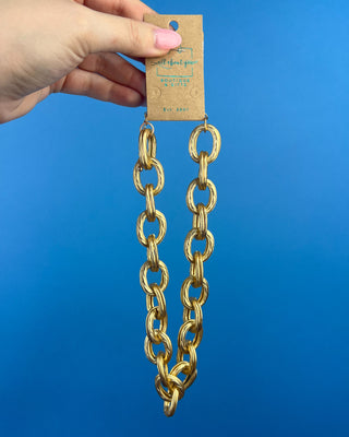 Shop the Keri Gold Link Necklace featuring bold textured oval links, an adjustable extender chain, and a timeless gold statement design.