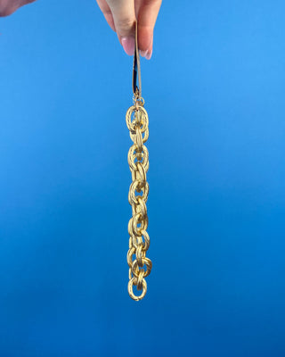 Shop the Keri Gold Link Necklace featuring bold textured oval links, an adjustable extender chain, and a timeless gold statement design.
