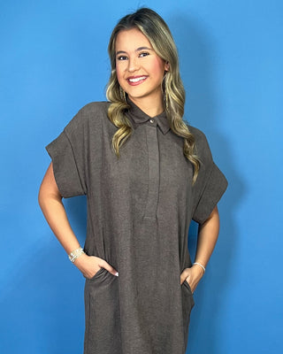 Charcoal gray collared midi dress with short sleeves, relaxed silhouette, hidden button placket, and side slits.