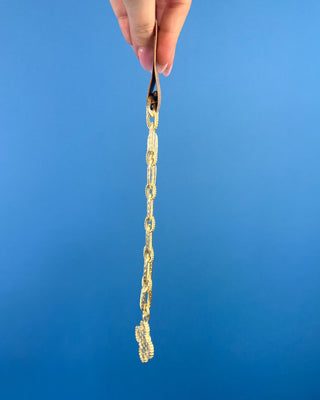 Shop the Chunky MOP Matte Gold Necklace featuring a mother-of-pearl quatrefoil pendant, chunky matte gold paperclip chain, and adjustable fit.