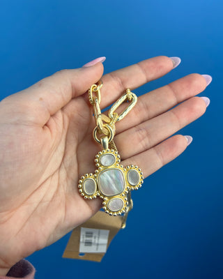 Shop the Chunky MOP Matte Gold Necklace featuring a mother-of-pearl quatrefoil pendant, chunky matte gold paperclip chain, and adjustable fit.