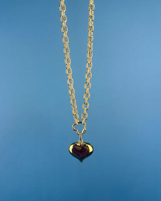 Shop the Chunky Gold Heart Necklace featuring a polished gold-tone chain, bold puffed heart pendant, and timeless statement design for every outfit.