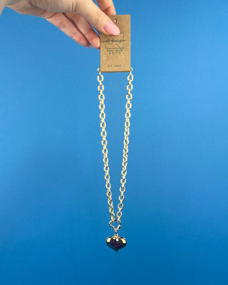 Shop the Chunky Gold Heart Necklace featuring a polished gold-tone chain, bold puffed heart pendant, and timeless statement design for every outfit.