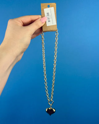 Shop the Chunky Gold Heart Necklace featuring a polished gold-tone chain, bold puffed heart pendant, and timeless statement design for every outfit.