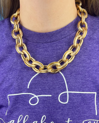 Shop the Keri Gold Link Necklace featuring bold textured oval links, an adjustable extender chain, and a timeless gold statement design.