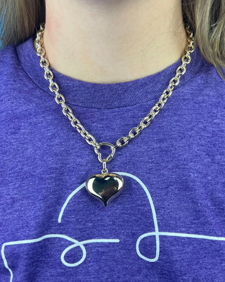 Shop the Chunky Gold Heart Necklace featuring a polished gold-tone chain, bold puffed heart pendant, and timeless statement design for every outfit.