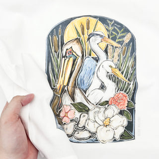 Decorative kitchen towel with pelican and egret design