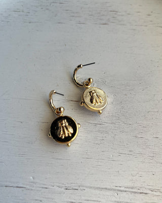 Shop the Gold & White Earrings featuring faceted white stone drops, gold-tone hoops, and a timeless design perfect for everyday wear and special occasions.