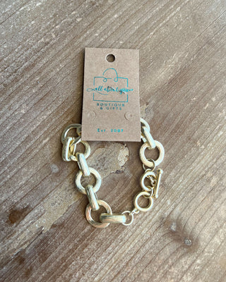 Shop the Chunky Matte Gold Bracelet featuring oversized mixed links, a matte gold finish, and an adjustable toggle closure for effortless everyday style.