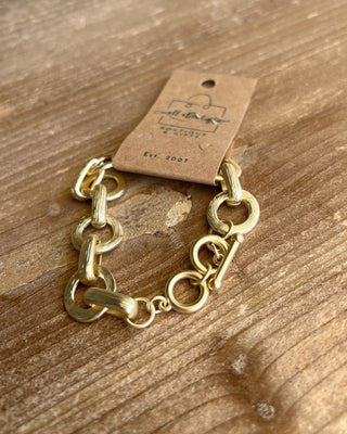 Shop the Chunky Matte Gold Bracelet featuring oversized mixed links, a matte gold finish, and an adjustable toggle closure for effortless everyday style.