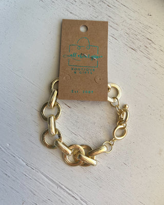 Shop the Chunky Matte Gold Bracelet featuring oversized mixed links, a matte gold finish, and an adjustable toggle closure for effortless everyday style.