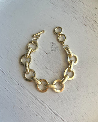 Shop the Chunky Matte Gold Bracelet featuring oversized mixed links, a matte gold finish, and an adjustable toggle closure for effortless everyday style.