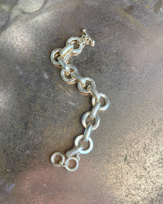 Shop the Chunky Matte Gold Bracelet featuring oversized mixed links, a matte gold finish, and an adjustable toggle closure for effortless everyday style.