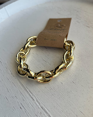 Shop the Gold Link Bracelet featuring oversized polished chain links and a timeless gold finish for the perfect everyday statement accessory.