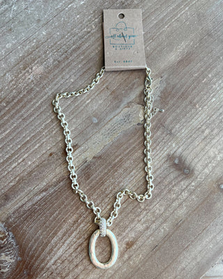 Shop the Matte Gold Chunky Necklace featuring a bold matte chain, organic oval pendant, crystal accent, and adjustable fit for effortless everyday style.