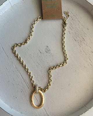 Shop the Matte Gold Chunky Necklace featuring a bold matte chain, organic oval pendant, crystal accent, and adjustable fit for effortless everyday style.