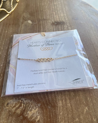 Shop the Mother Of... Hearts Connected Bracelet Collection featuring meaningful heart designs, sparkling cubic zirconia, and adjustable gift-ready bracelets for moms.