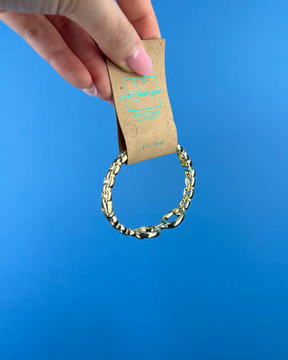 Shop the Gold Horse Bit Bracelet featuring a polished gold finish, stretch fit, and timeless equestrian-inspired horse bit design for everyday elegance.