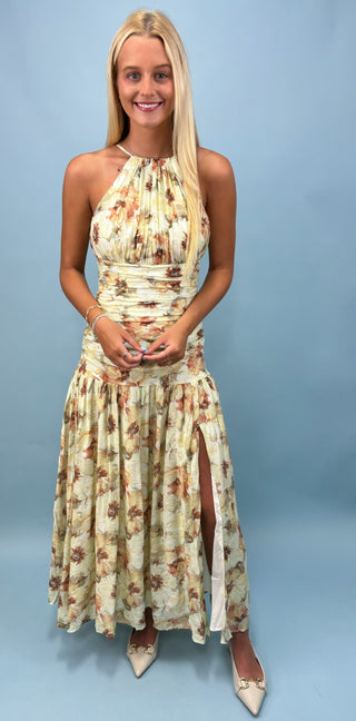 Woman wearing a floral dress on a light blue background