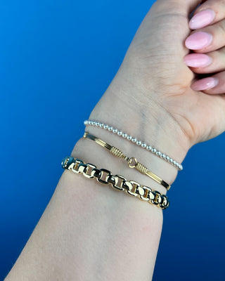 Shop the Gold Horse Bit Bracelet featuring a polished gold finish, stretch fit, and timeless equestrian-inspired horse bit design for everyday elegance.
