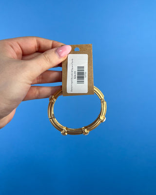 Shop the Grace Gold Hinged with Square Crystals Bracelet featuring a polished gold finish and sparkling square crystals for timeless everyday elegance.