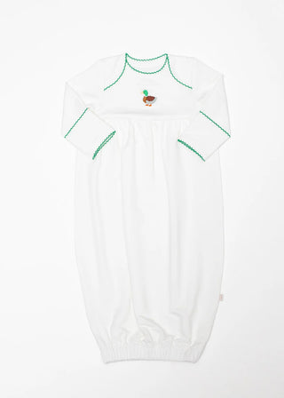 White baby onesie with green trim and a small design on a white background