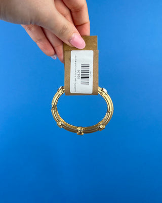 Shop the Grace Gold Hinged with Square Crystals Bracelet featuring a polished gold finish and sparkling square crystals for timeless everyday elegance.
