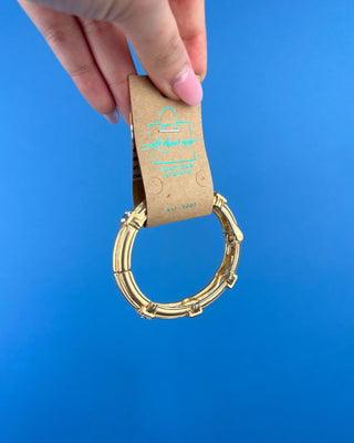 Shop the Grace Gold Hinged with Square Crystals Bracelet featuring a polished gold finish and sparkling square crystals for timeless everyday elegance.