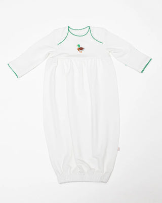 White baby onesie with green accents on a white background