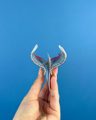 Shop the Santa Hair Clip featuring a pearlescent Santa design, pink heart sunglasses, and festive holiday details. A cute Christmas claw clip!