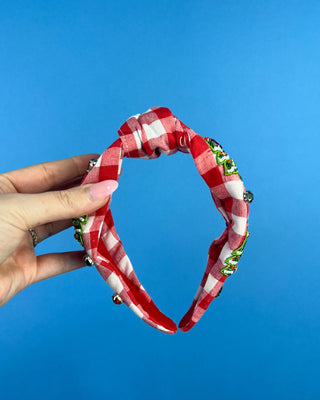 Shop the Red Gingham Christmas Headband featuring beaded Christmas trees, sparkling rhinestones, and a festive knotted design. Perfect for holiday outfits!