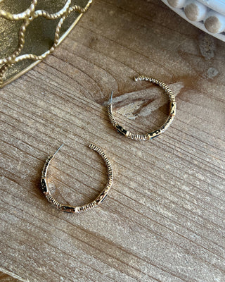 Shop the Lexi Blue Stone Hoops featuring gold-tone hoops, sparkling clear rhinestones, and deep blue rectangular stones. Perfect for everyday and dressy outfits!
