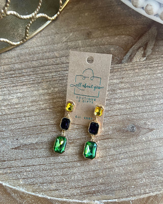 Shop the Mardi Gras Drop Crystal Earrings featuring sparkling purple, green, and gold crystals with elegant gold-tone settings. Perfect for Mardi Gras celebrations.
