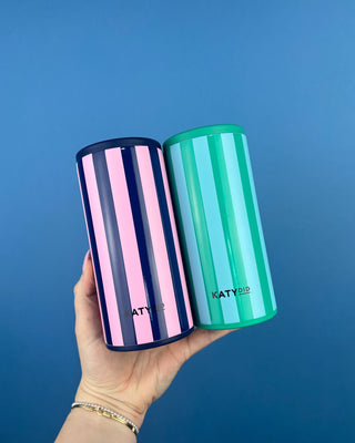 Shop the KATYDID Striped Slim Can Cooler in multiple fun colors! Featuring bold stripes and a removable top, perfect for beach days, pool parties, and gifts.