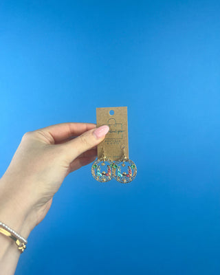 Shop the Holy Family Earrings at All About You Boutique! Gold-tone Nativity Christmas earrings featuring Mary, Joseph, baby Jesus, and sparkling rhinestones.