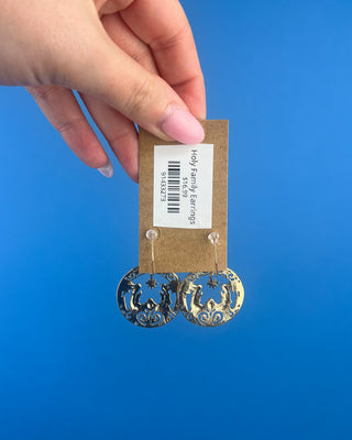 Shop the Holy Family Earrings at All About You Boutique! Gold-tone Nativity Christmas earrings featuring Mary, Joseph, baby Jesus, and sparkling rhinestones.