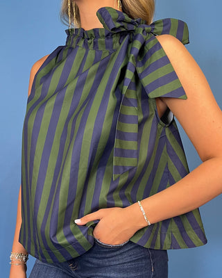Navy and green striped sleeveless top with a ruffle neckline, statement shoulder tie, and relaxed silhouette.