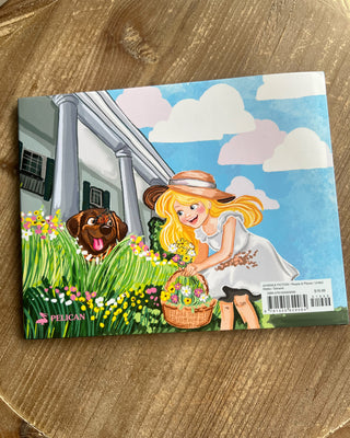 Shop the Louise's Garden Hardcover Book, a charming Louisiana children's story featuring the Governor's Mansion, colorful gardens, and a playful dog named Cani.