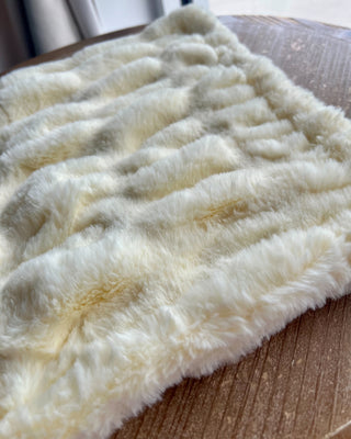 Shop the Bei Bei Faux Fur Lovey in blue, pink, yellow, and ivory. Soft, fluffy baby loveys with sweet messages, perfect for baby showers and newborn gifts.