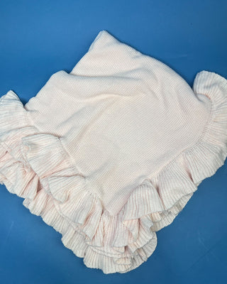 Shop the Ruffle Knit Baby Blanket in Petal Pink & Cloud White. Features soft textured knit and delicate double-layered ruffles. Perfect for baby gifts.