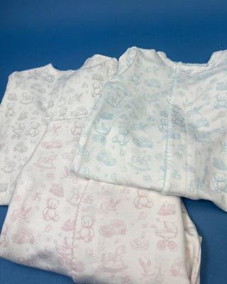 Shop the Blue Nursery Toile Snap Romper by Bei Bei, featuring soft bamboo-blend fabric, vintage baby prints, snap closures, and a classic footed design.