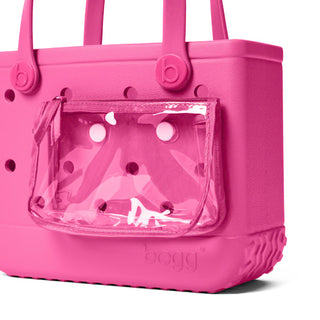 Pink handbag with clear pouch on a white background