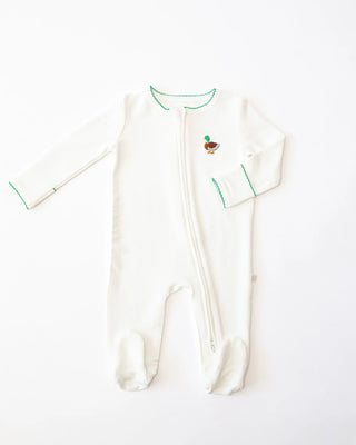 White baby onesie with green accents on a white background