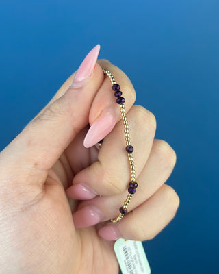 Shop the Enewton Gameday Flirty Hope Unwritten Purple Bracelet featuring polished gold beads and sparkling purple accents. Perfect for game day and everyday!