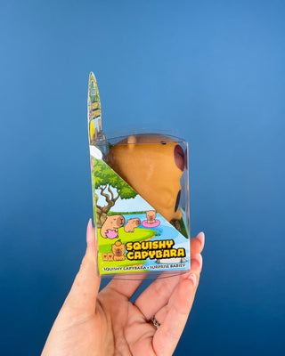 Shop the Squishy Capybara! This adorable sensory toy features a soft, squeezable body and 3, 4, or 5 surprise baby capybaras hidden inside.